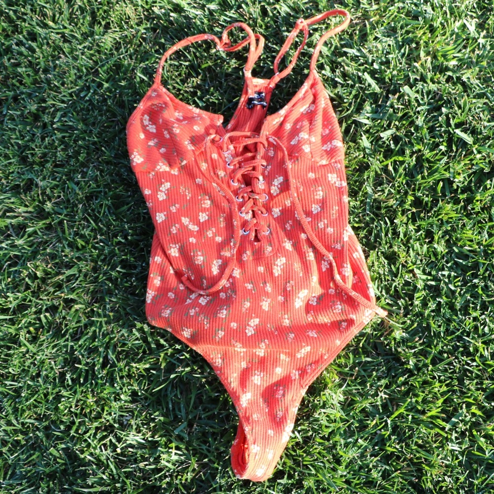 Urban outfitters orange body suit